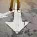 crossroads arrow in roadway